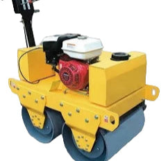 Yellow road roller with engine